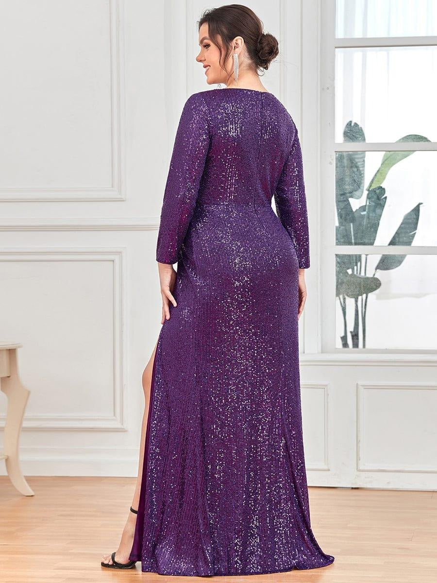 Formal long dress with a neckline and long sleeves.
